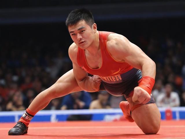 九游体育网站_ 传统摔跤表演，传承文化展现力量，体育摔跤项目